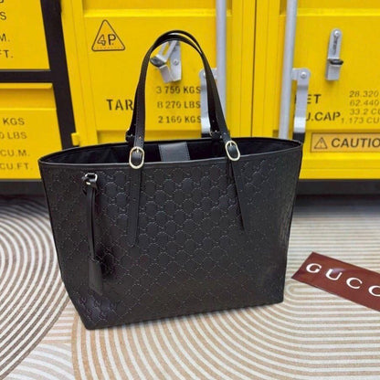 Gucci GG Emblem Debossed Leather Tote Bag