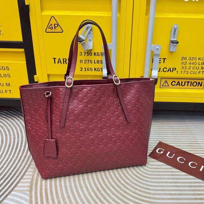 Gucci GG Emblem Debossed Leather Tote Bag