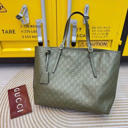 Gucci GG Emblem Debossed Leather Tote Bag