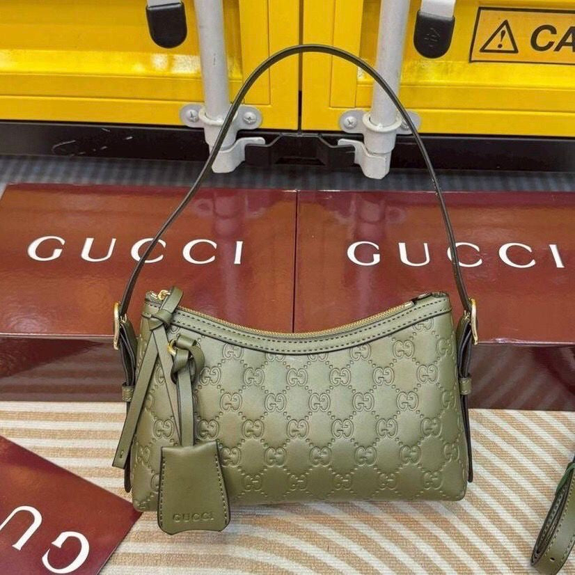 Gucci GG Embossed Leather Shoulder Bag – Rosso Ancora