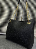 LOUIS VUITTON
Surene MM Monogram Empreinte Leather