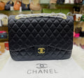 CHANEL Jumbo Classic Double Flap – Black Caviar with Gold Hardware