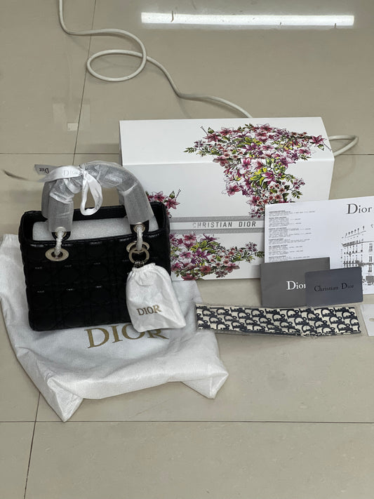 Lady Dior Black Cannage Lambskin Handbag – Silver Charm Detail