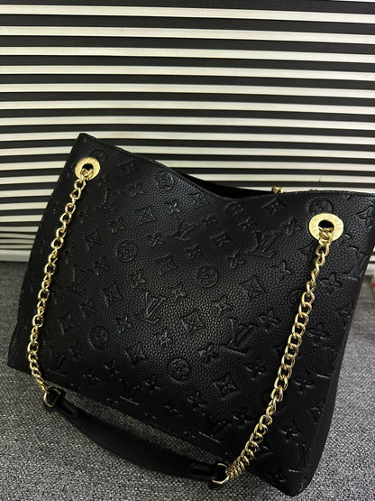LOUIS VUITTON
Surene MM Monogram Empreinte Leather