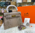 Hermès Kelly 28cm Crocodile – Palladium Hardware Prestige